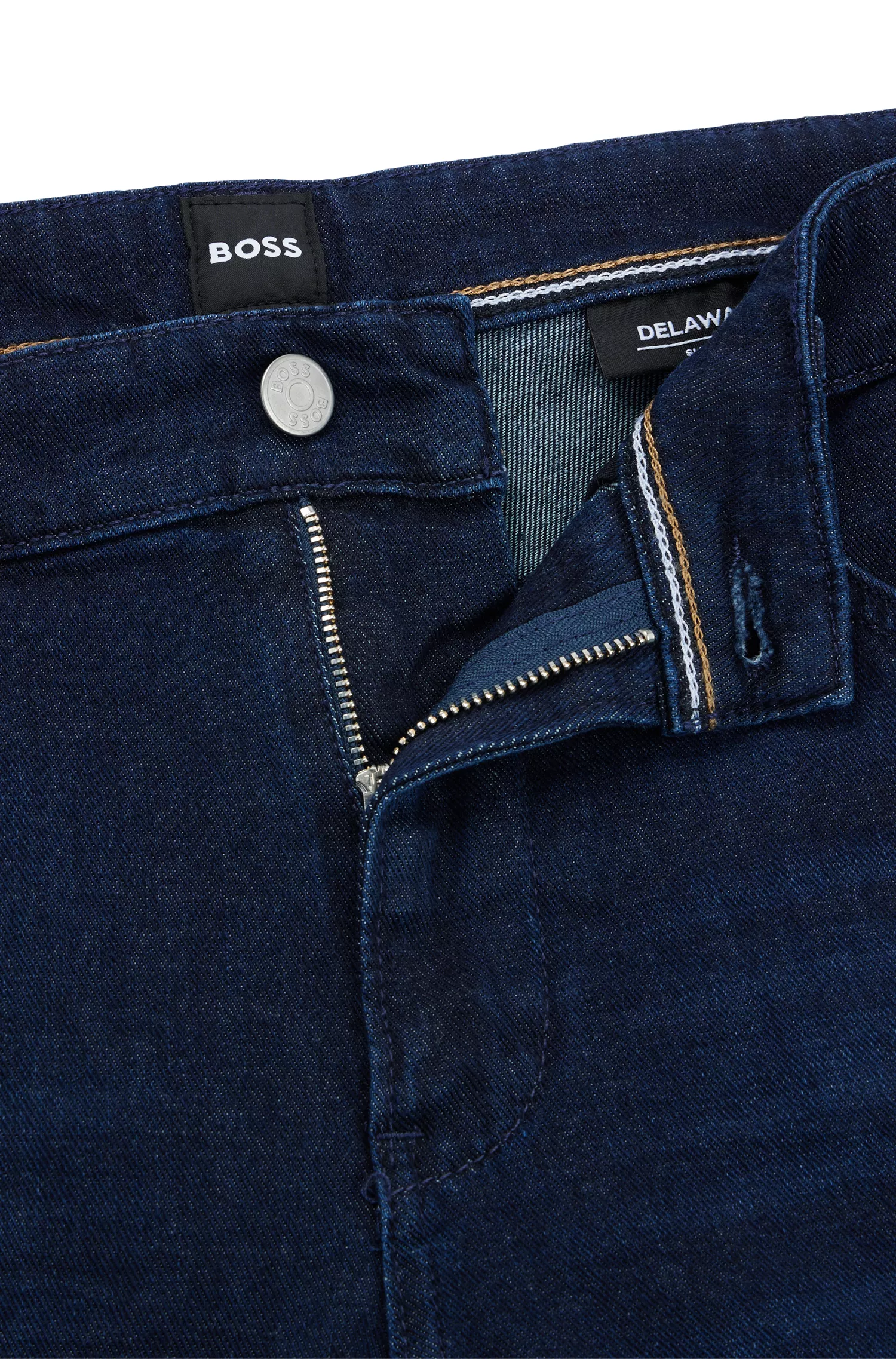 Calça jeans BOSS preta, corte slim, em denim italiano supermacio azul-escuro.