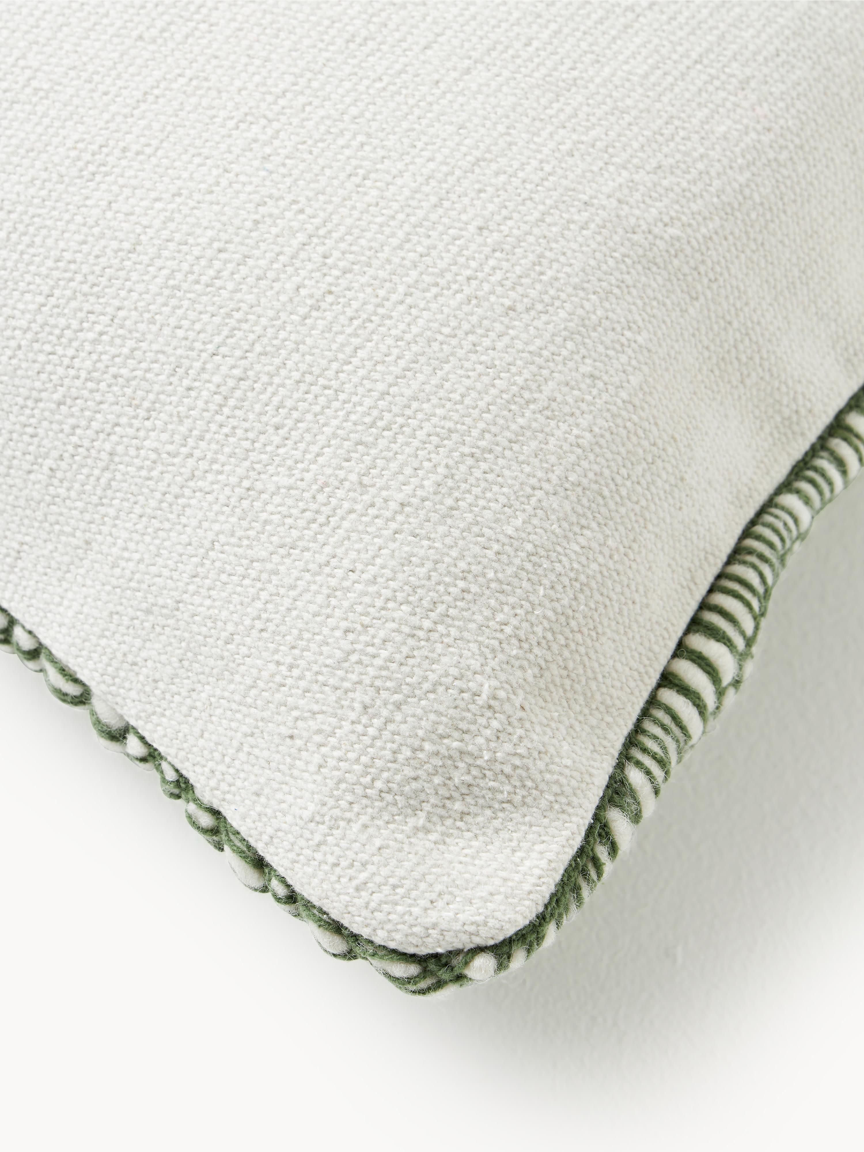 Geborduurde wollenkussenhoes Jaira