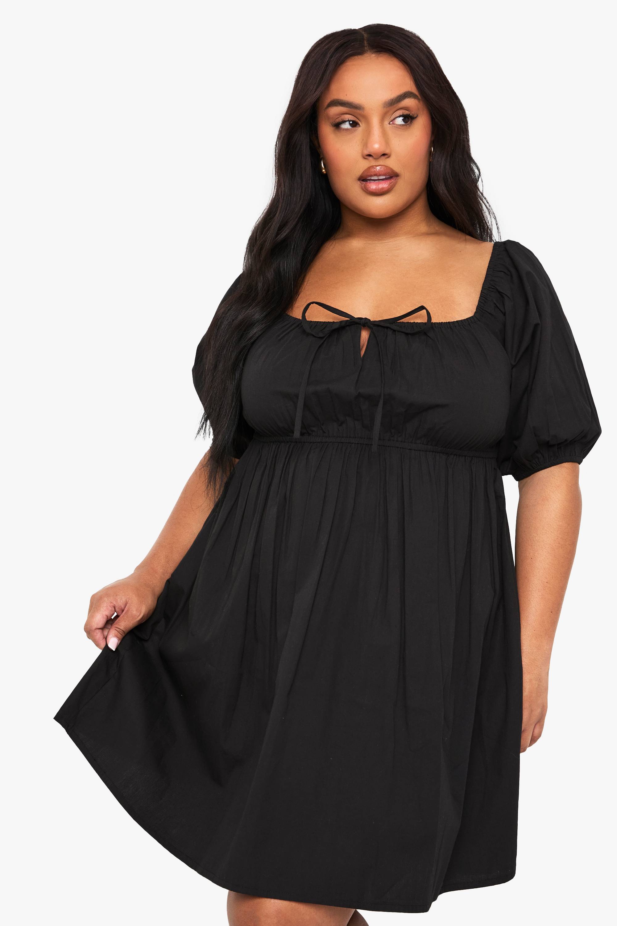 boohoo Robe skater en coton plissée avec nœud à l’avant