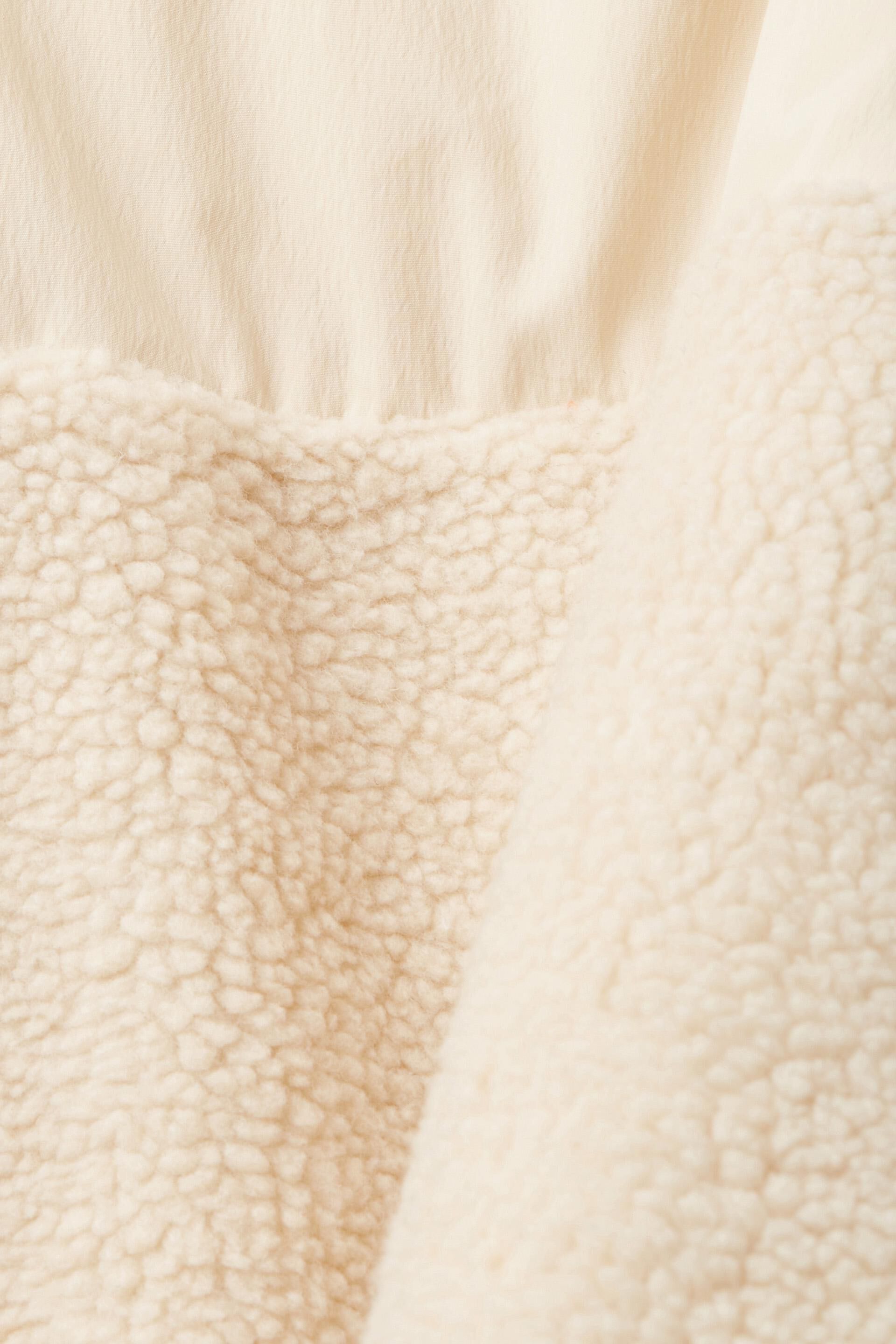 Veste courte en matières mélangées