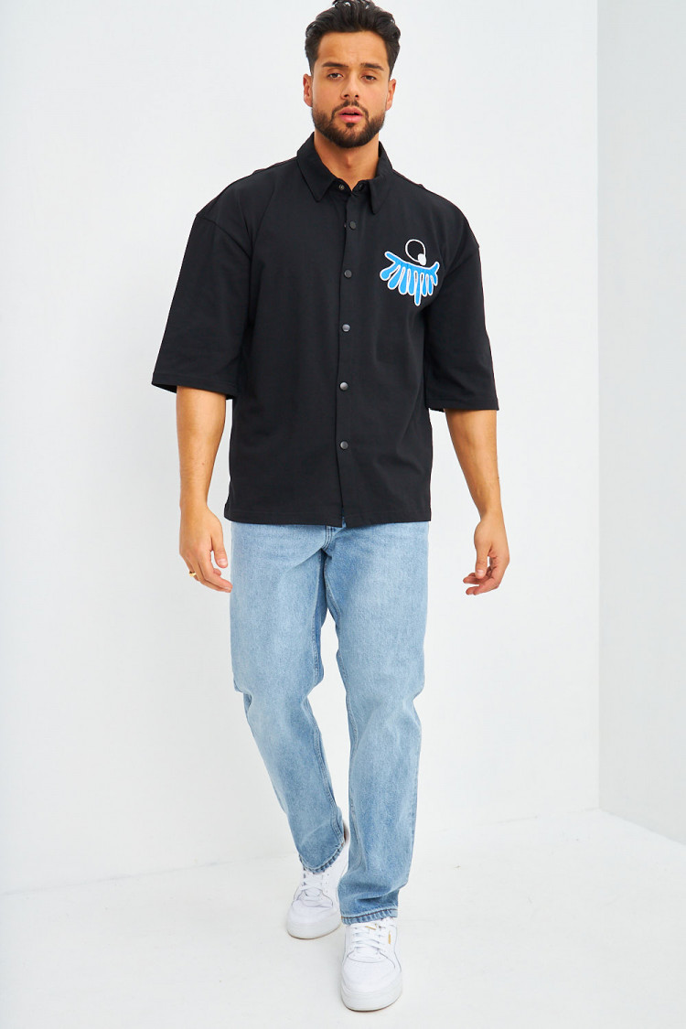 Chemise noire oversize à patchs
