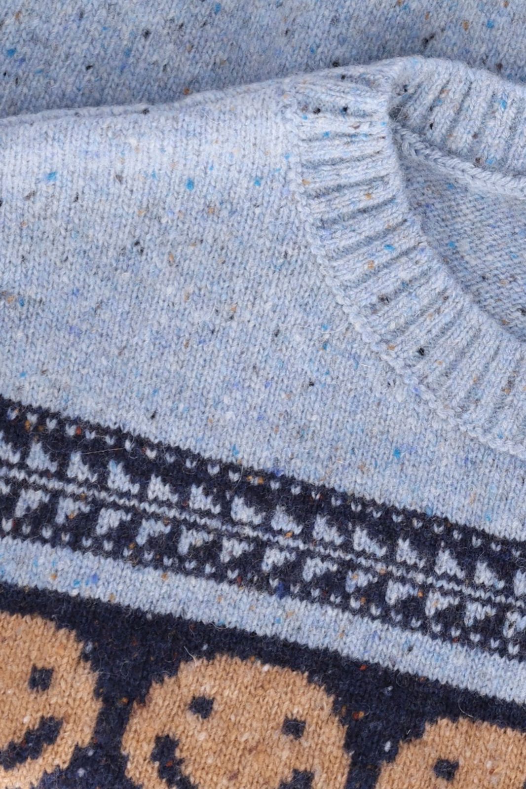 Blauwe gebreide spencer met artwork
