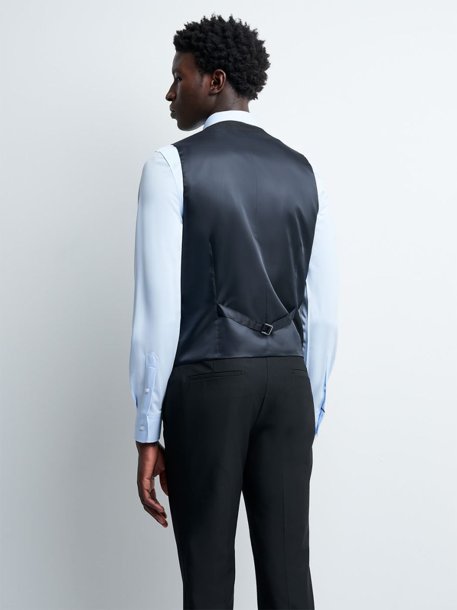 Gilet coordonnable en poly-viscose uni