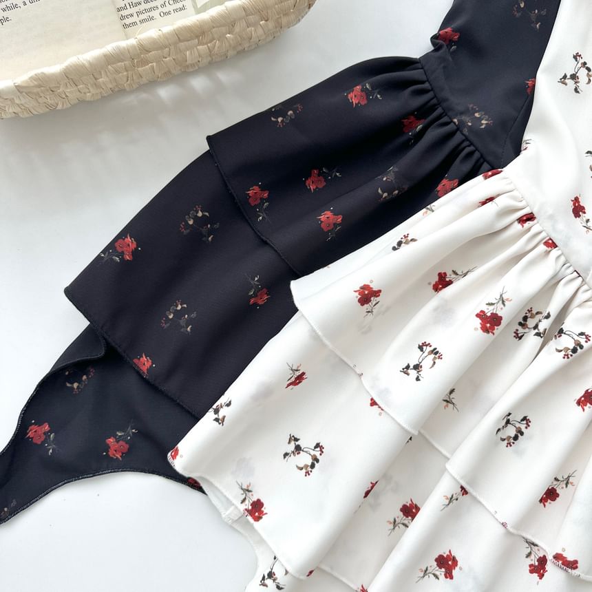 Warelmapo - Mouwloze, asymmetrische mini-A-lijnjurk met bloemenprint