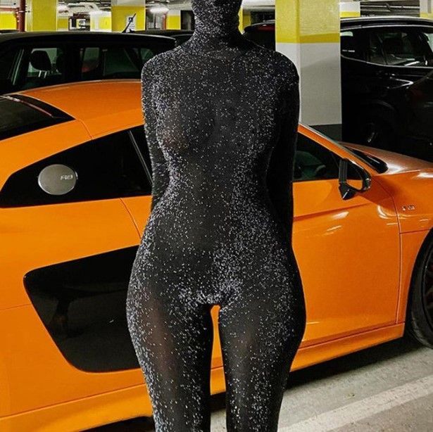 Oonnukal - Glitterjumpsuit met lange mouwen