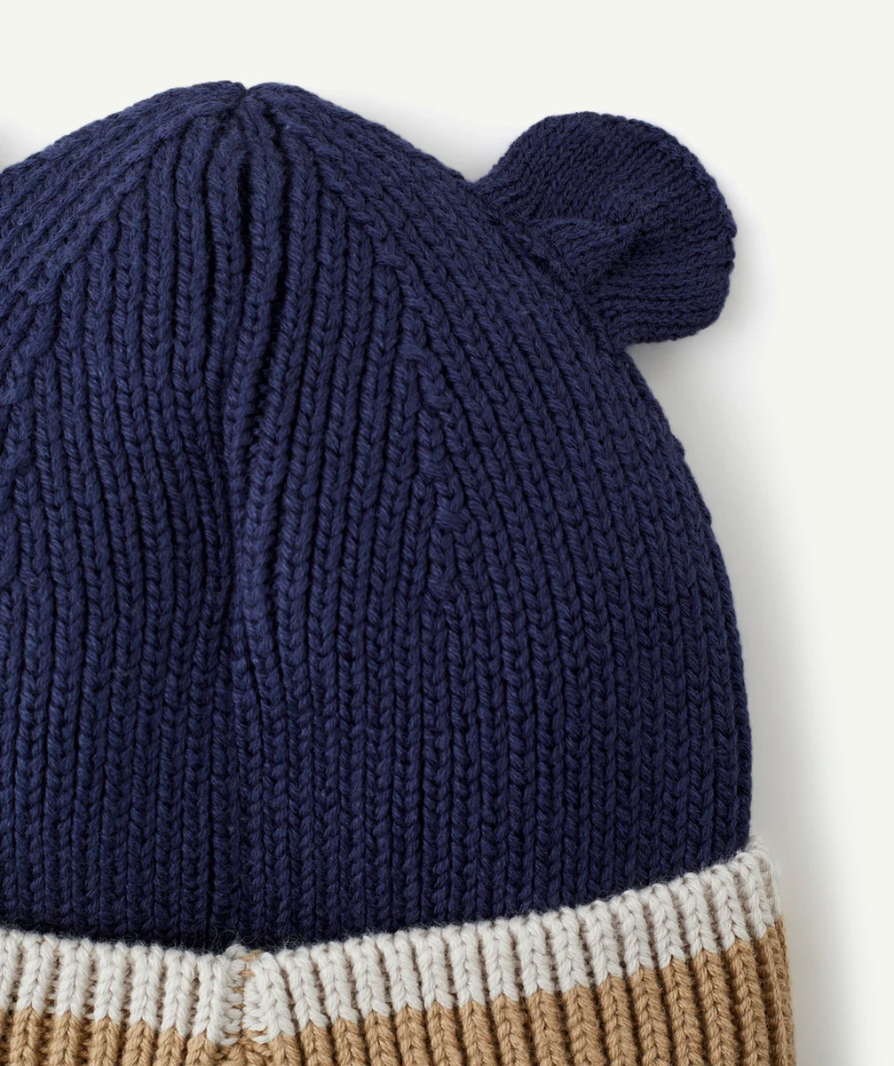 LIEWOODBONNET GINA EN TRICOT CÔTELÉ ET COTON BIO BLEU MARINE ET BEIGE AVEC OREILLES D’OURS