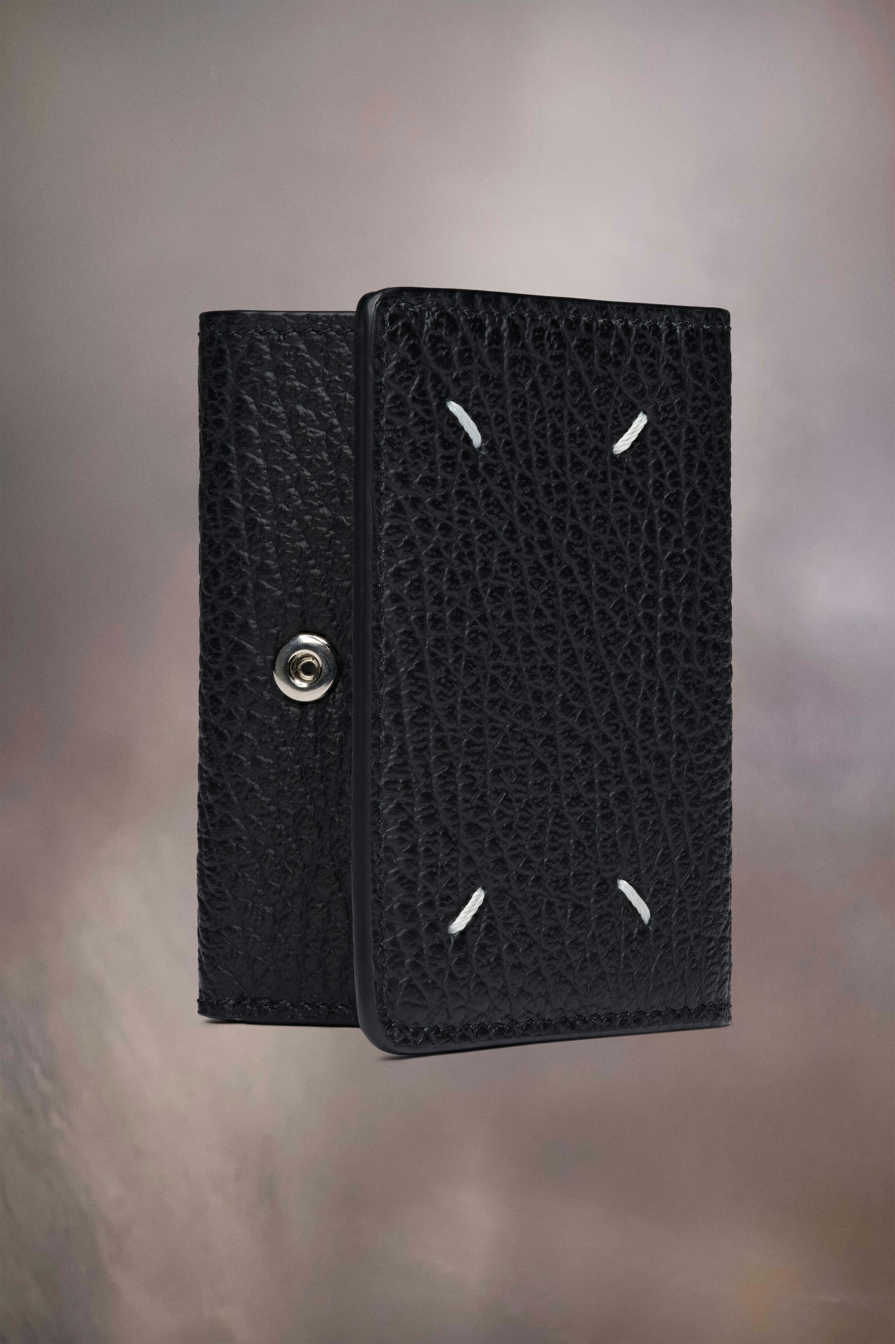 Portefeuille en cuir gaufré - plié en trois Noir