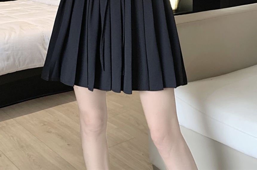 Dandijoy - Minirok met hoge taille en trekkoord, effen en geplooid