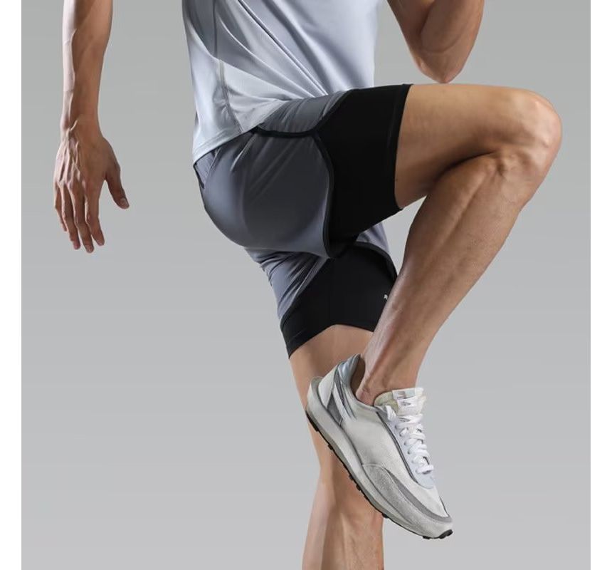 Acrius - Tweedelige hardloopshort met trekkoord in de taille