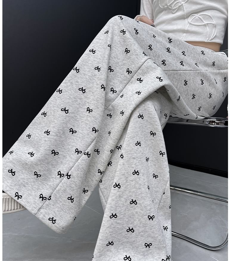 evanesce - Joggingbroek met hoge taille en wijde pijpen en strikprint