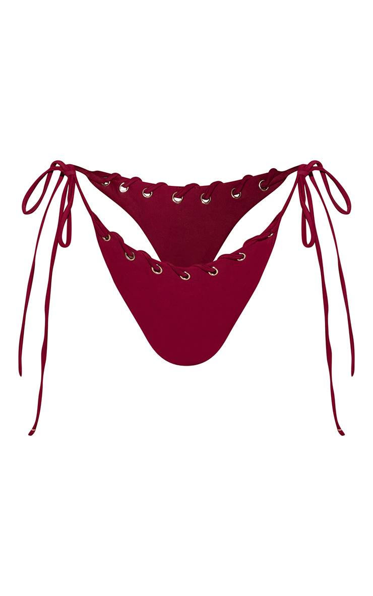 Prune Bas De Bikini À Œillets Avec Liens Sur Les Côtés