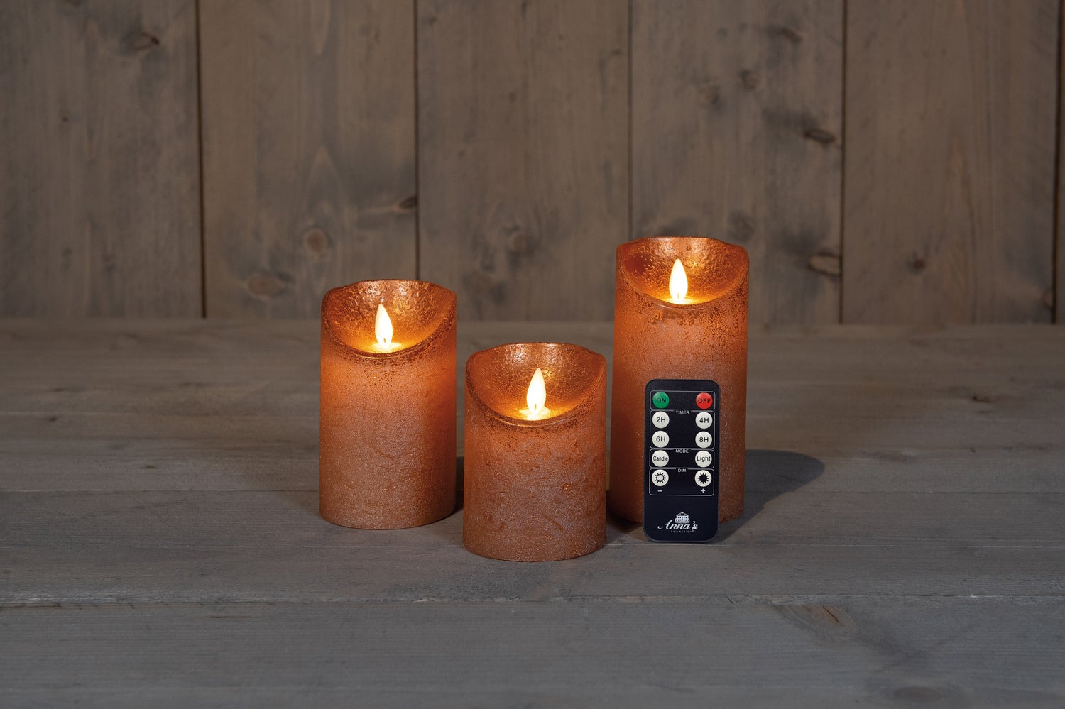 Anna's Collection LED stompkaars Rustiek koper / oranje D 7,5 H 10 / 12,5 / 15 cm 3 stuks