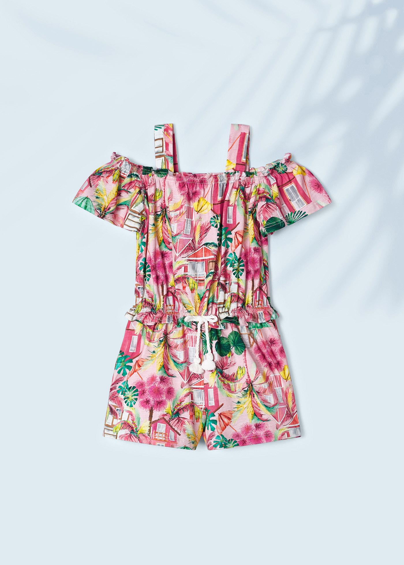 Macacão curto estampado para meninas, feito de algodão sustentável.