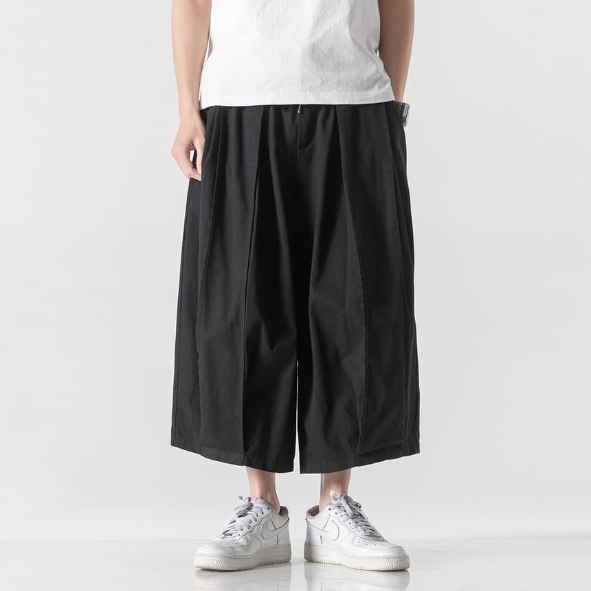 Orungeetun - Effen cropped broek met wijde pijpen en trekkoordtaille