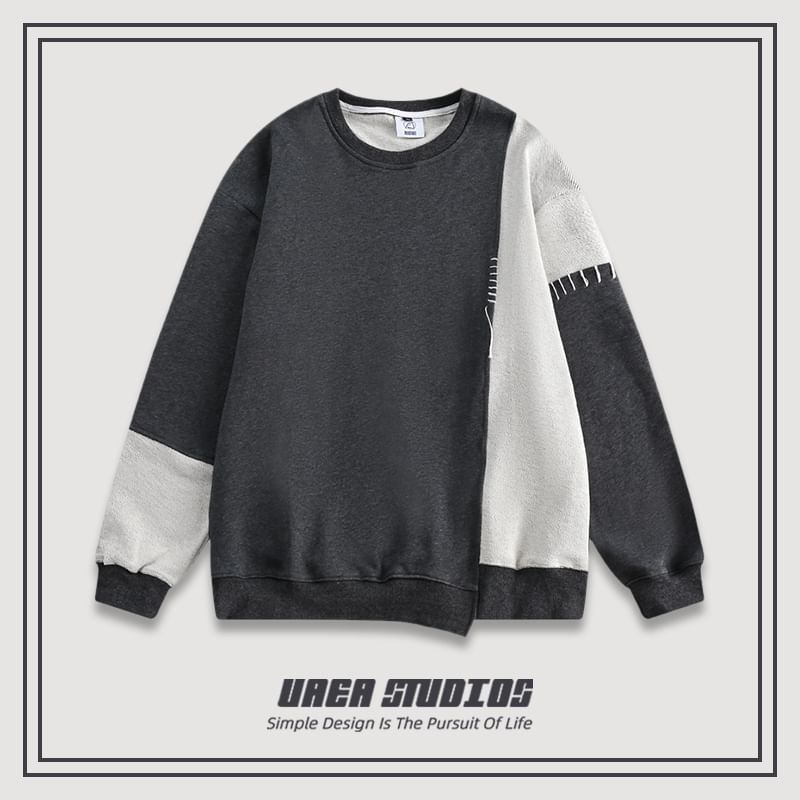 Chuoku - Asymmetrische sweatshirt met ronde hals en patchwork