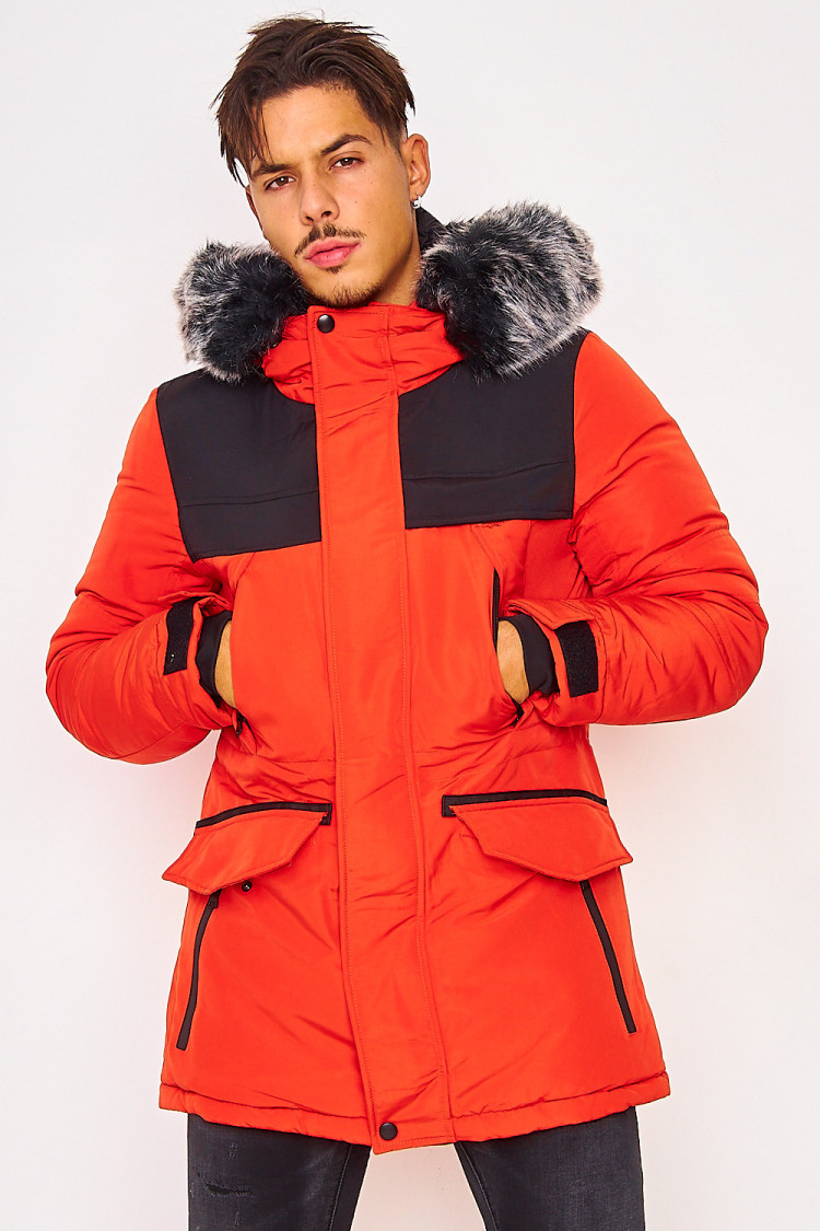 Parka orange/noir capuche à fourrure