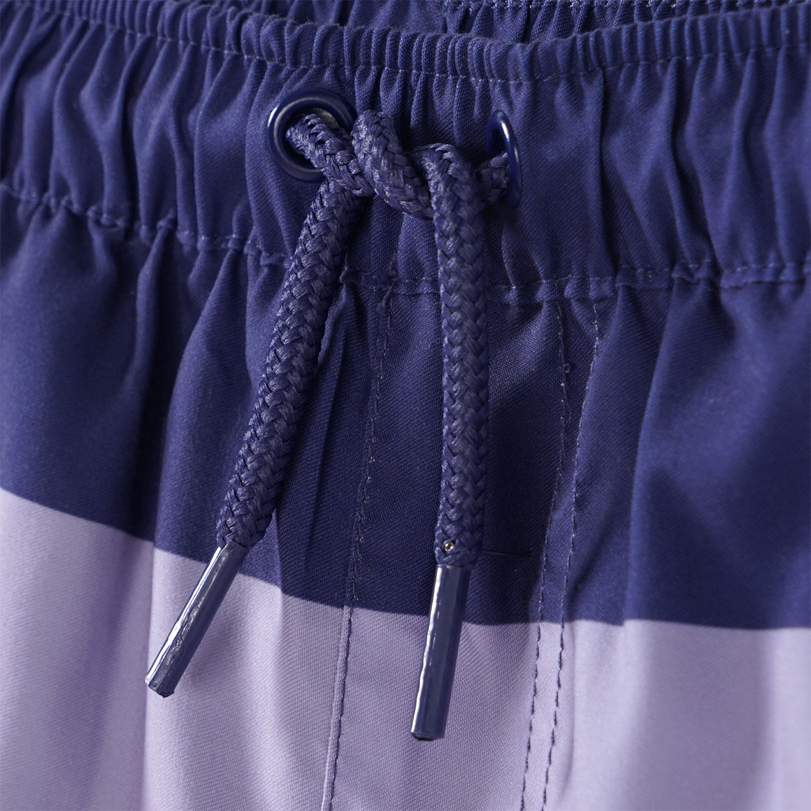Famy Baby Badeshorts mit Streifen dunkellila / helllila