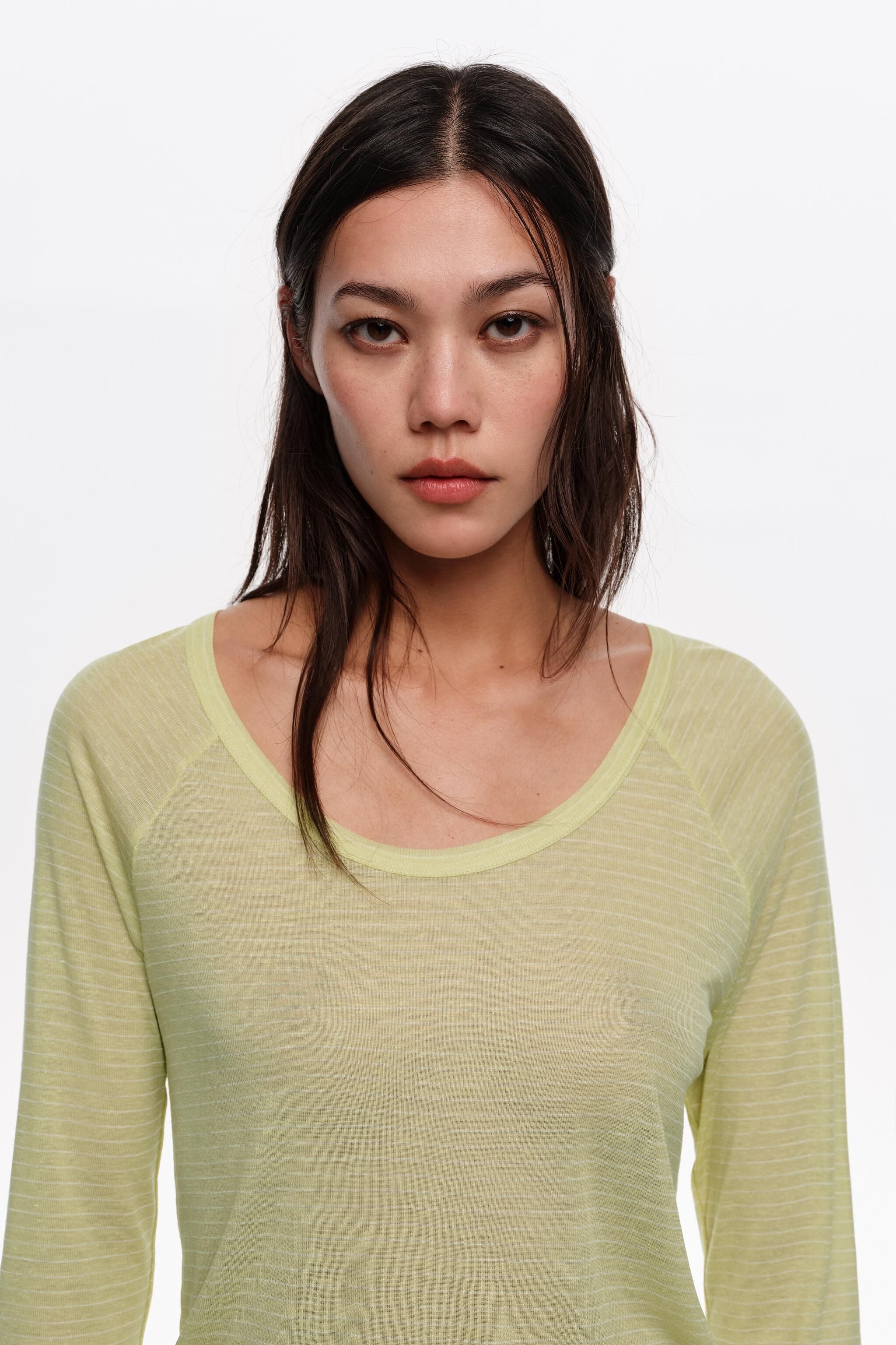 Camiseta raglan listrada em verde limão