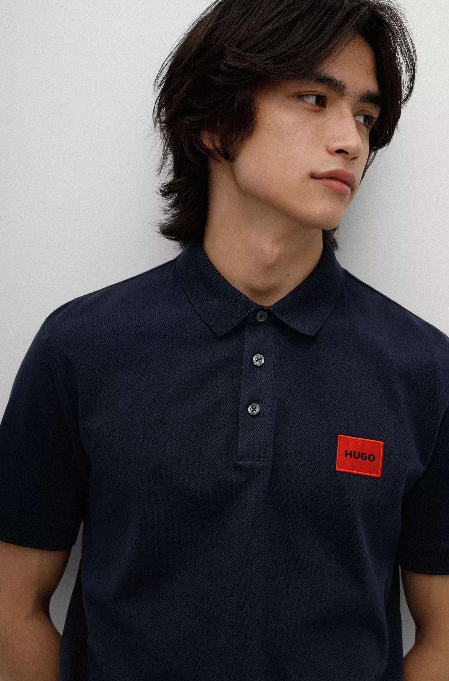 Camisa polo HUGO vermelha em piqué de algodão com corte slim e etiqueta com o logotipo.