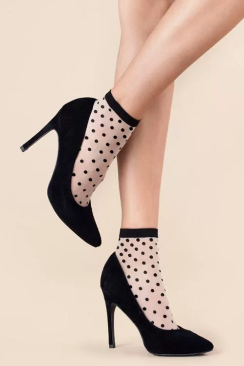 Fiorella Schattige polkadotsokken in beige en zwart