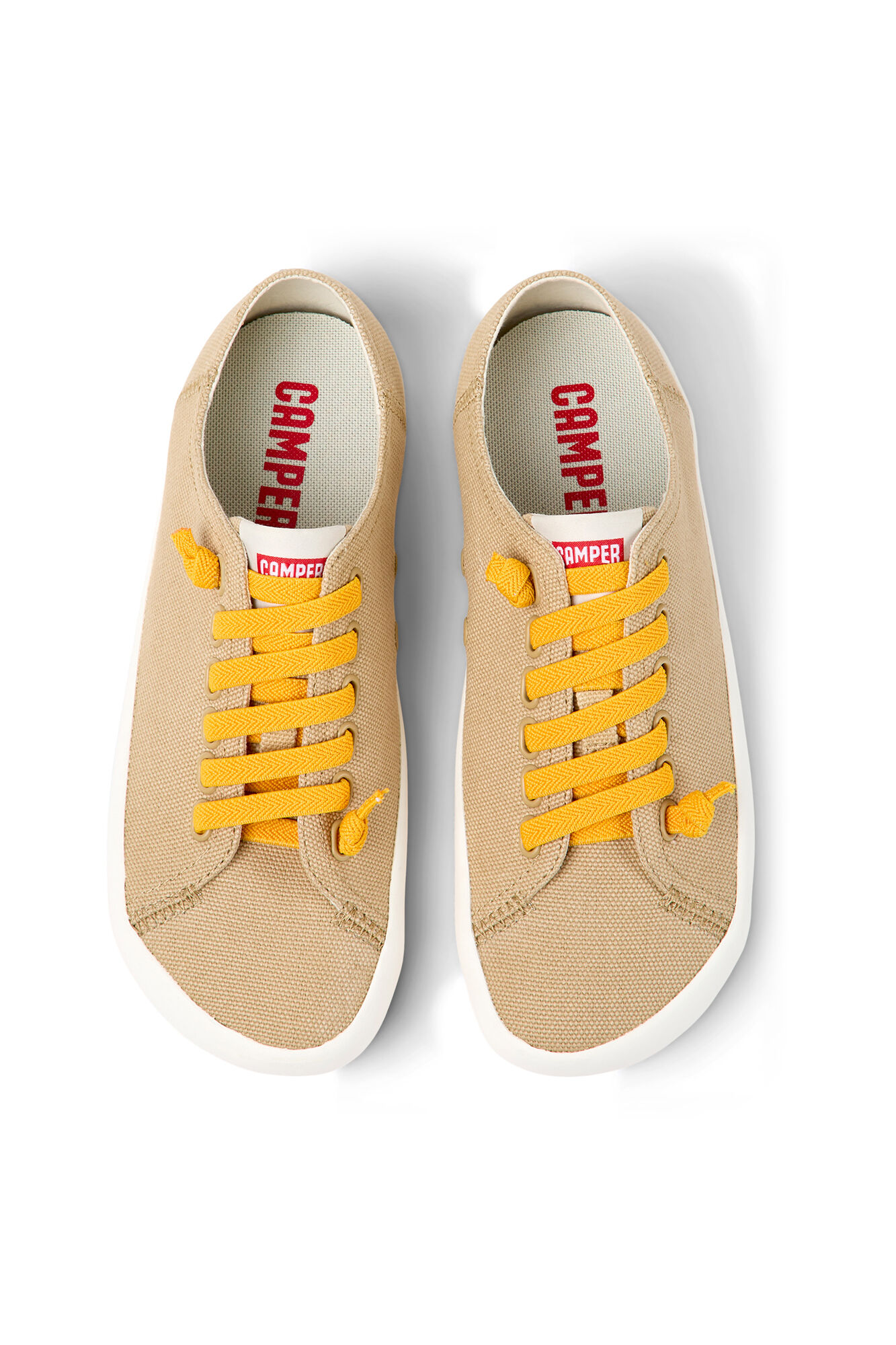 Tênis feminino amarelo trançado. - bege