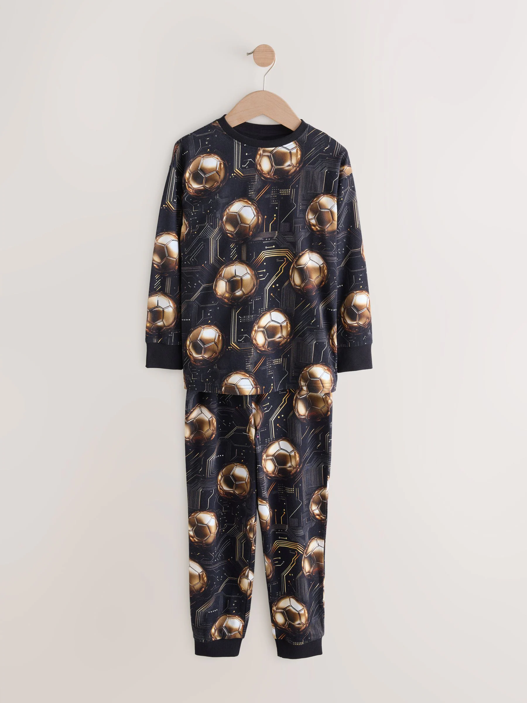 Zwart met goudkleurige voetbal - Verpakking van 2 pyjama's met lange mouwen (3-16 jr)