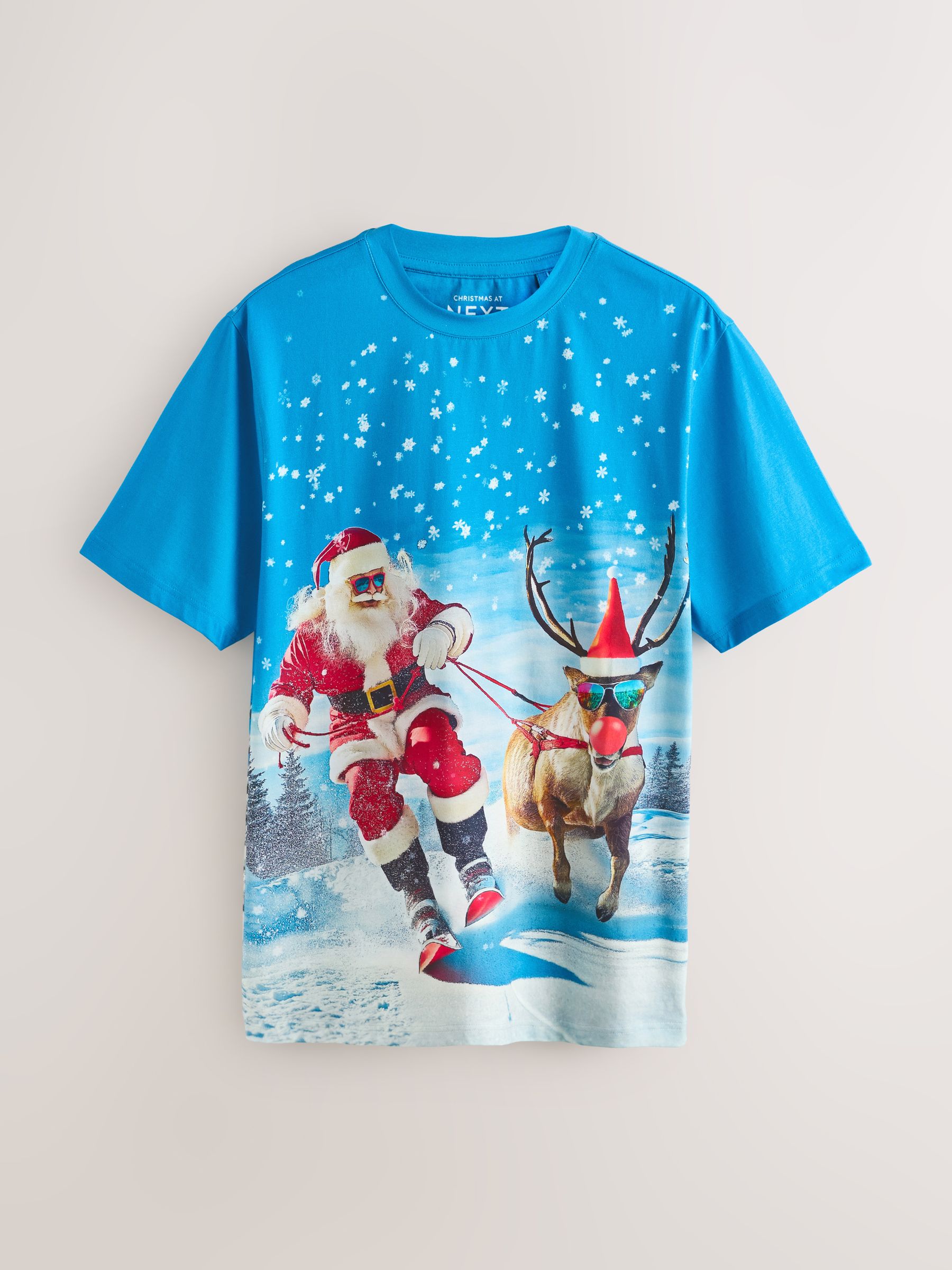 Blauwe Skiënde Kerstman - Normale Pasvorm - Kerst T-shirt
