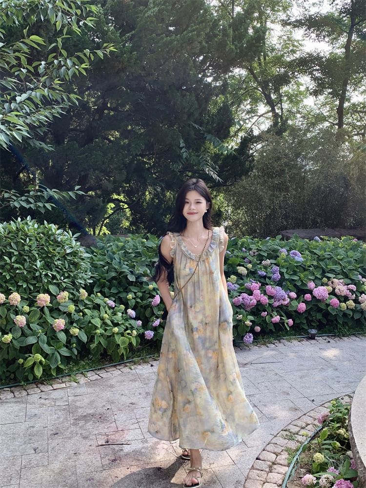 Trendycas - Mouwloze V-hals maxi-A-lijn jurk met bloemenprint