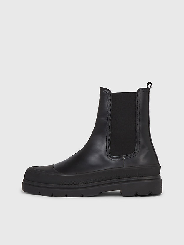 botas de couro até o tornozelo