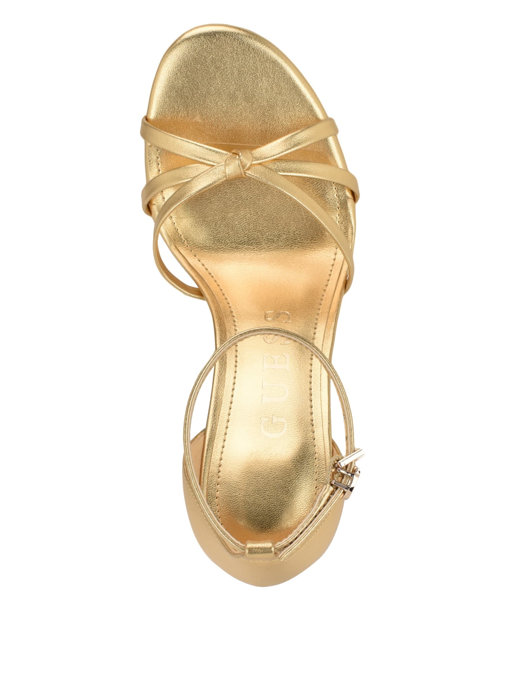 Sapatos de salto agulha com nó de primavera