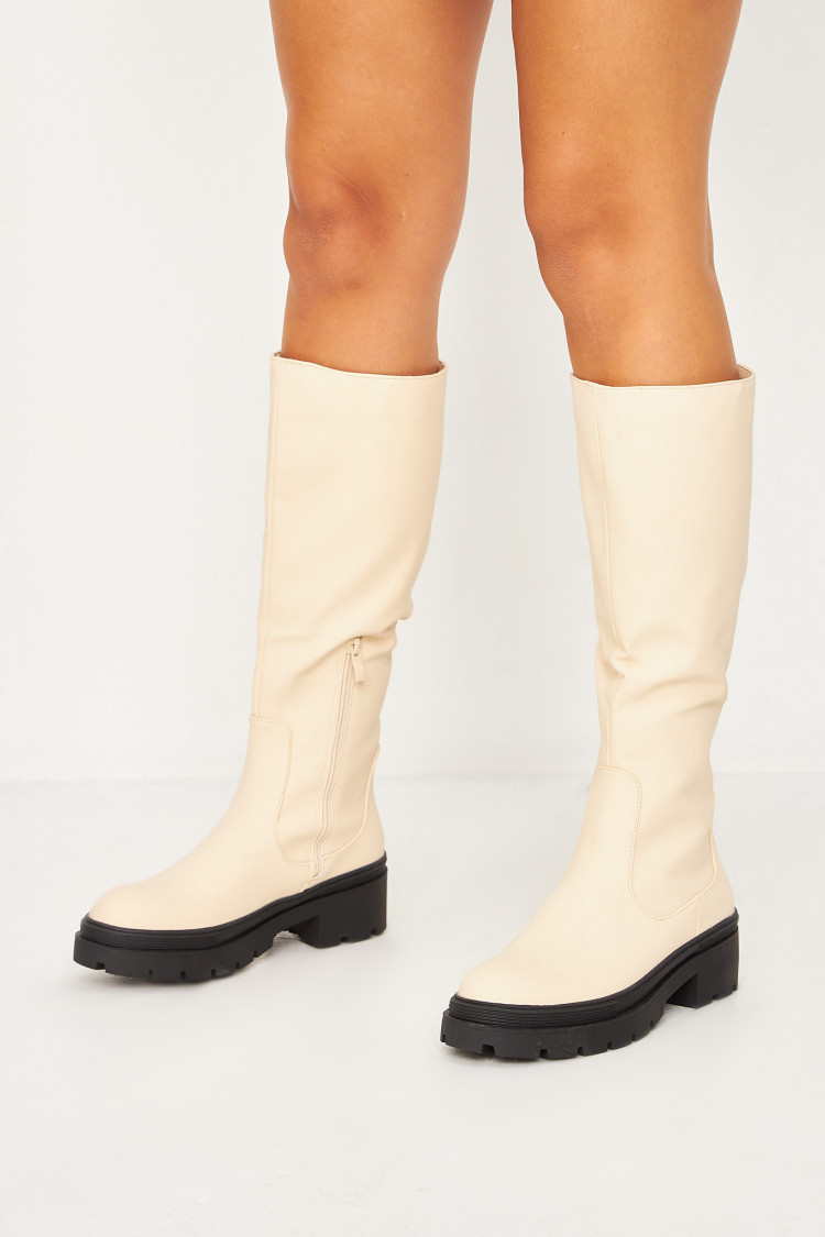 Bottes beiges à semelle noire