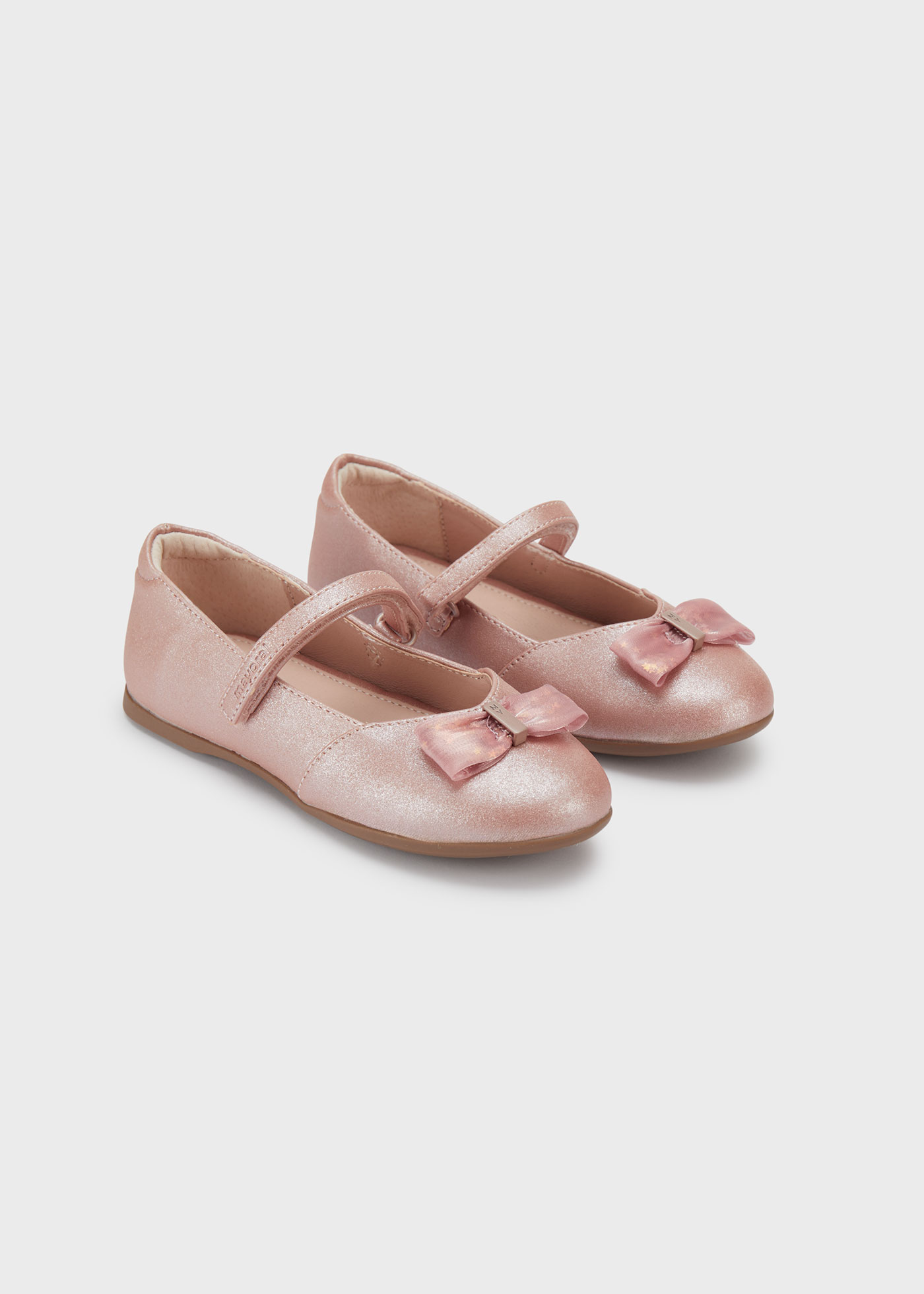 Sapato estilo Mary Jane com palmilha com laço, em couro sustentável, para meninas.