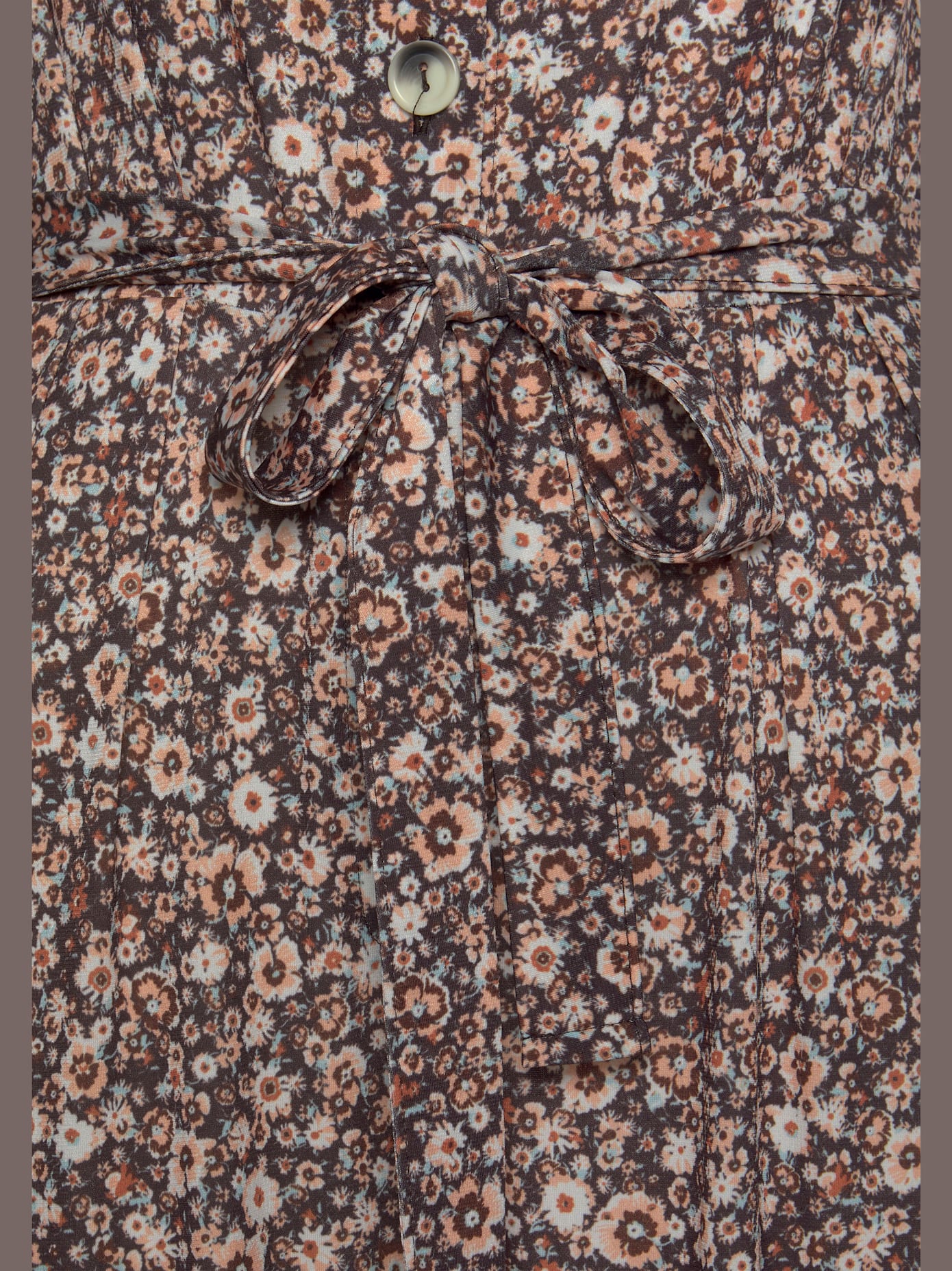 Combinaison jupe-culotte patte de boutonnage devant