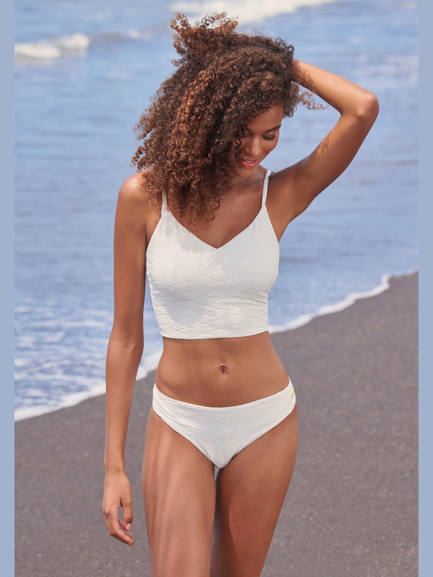 Haut de maillot de bain court matière structurée aux couleurs tendances