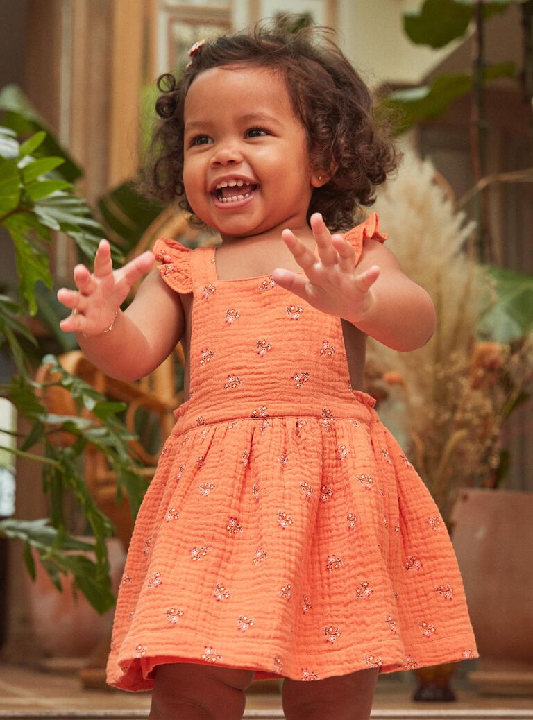Robe chasuble orange en gaze de coton à imprimé fleuri
