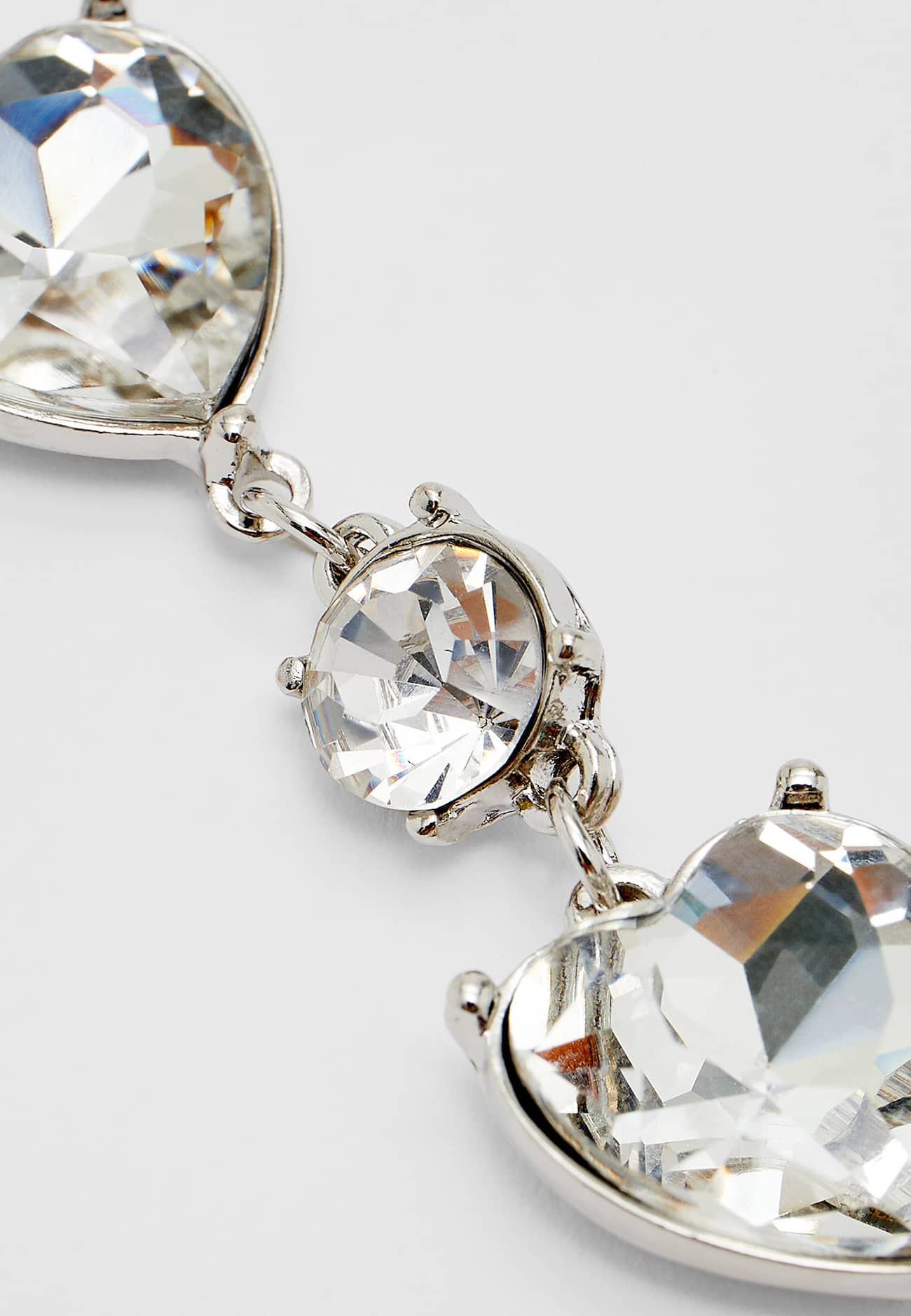 Brincos de coração com strass