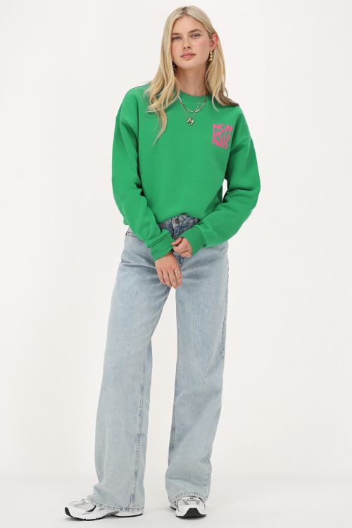 Groene sweater met roze 