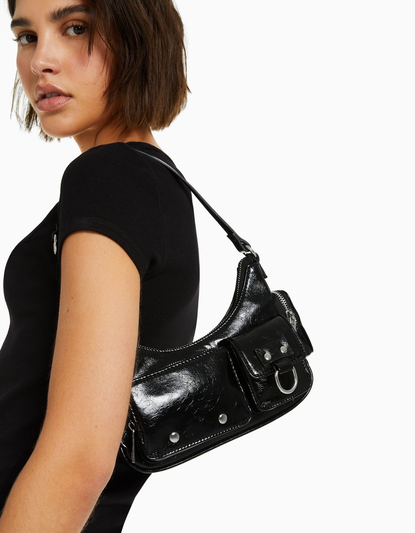 Bolsa de ombro com vários bolsos