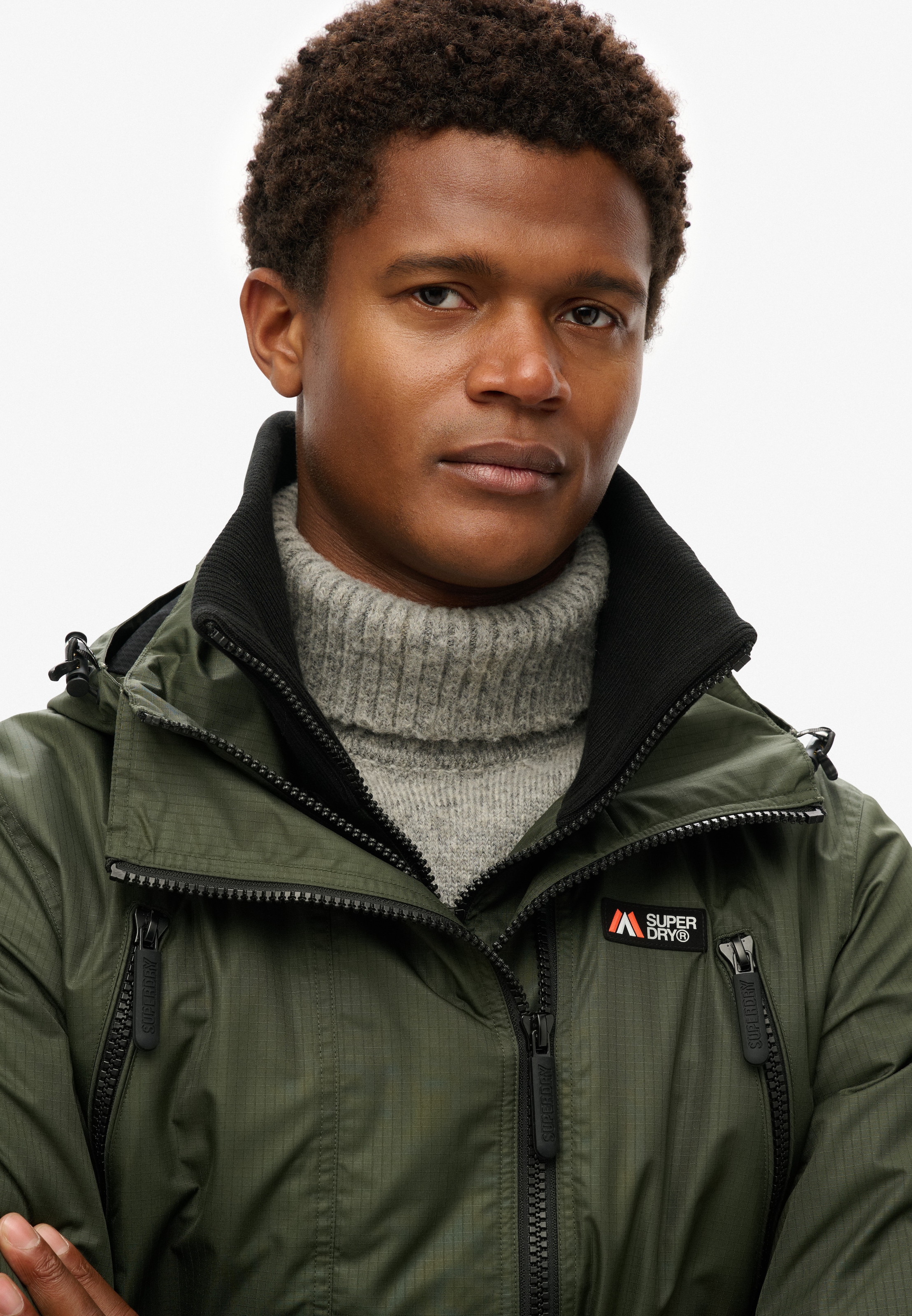 Superdry Outdoorjacke »HOODED MTN WINDBREAKER JACKET« mit Kapuze