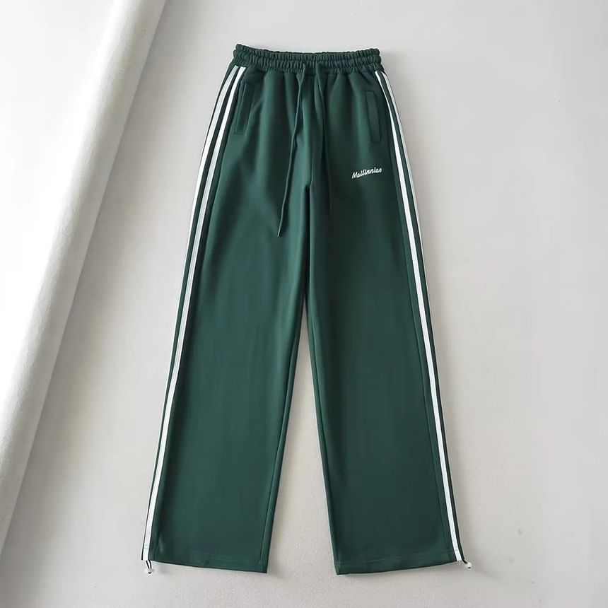 Reknovine - Wijde joggingbroek met trekkoord en gestreepte letters