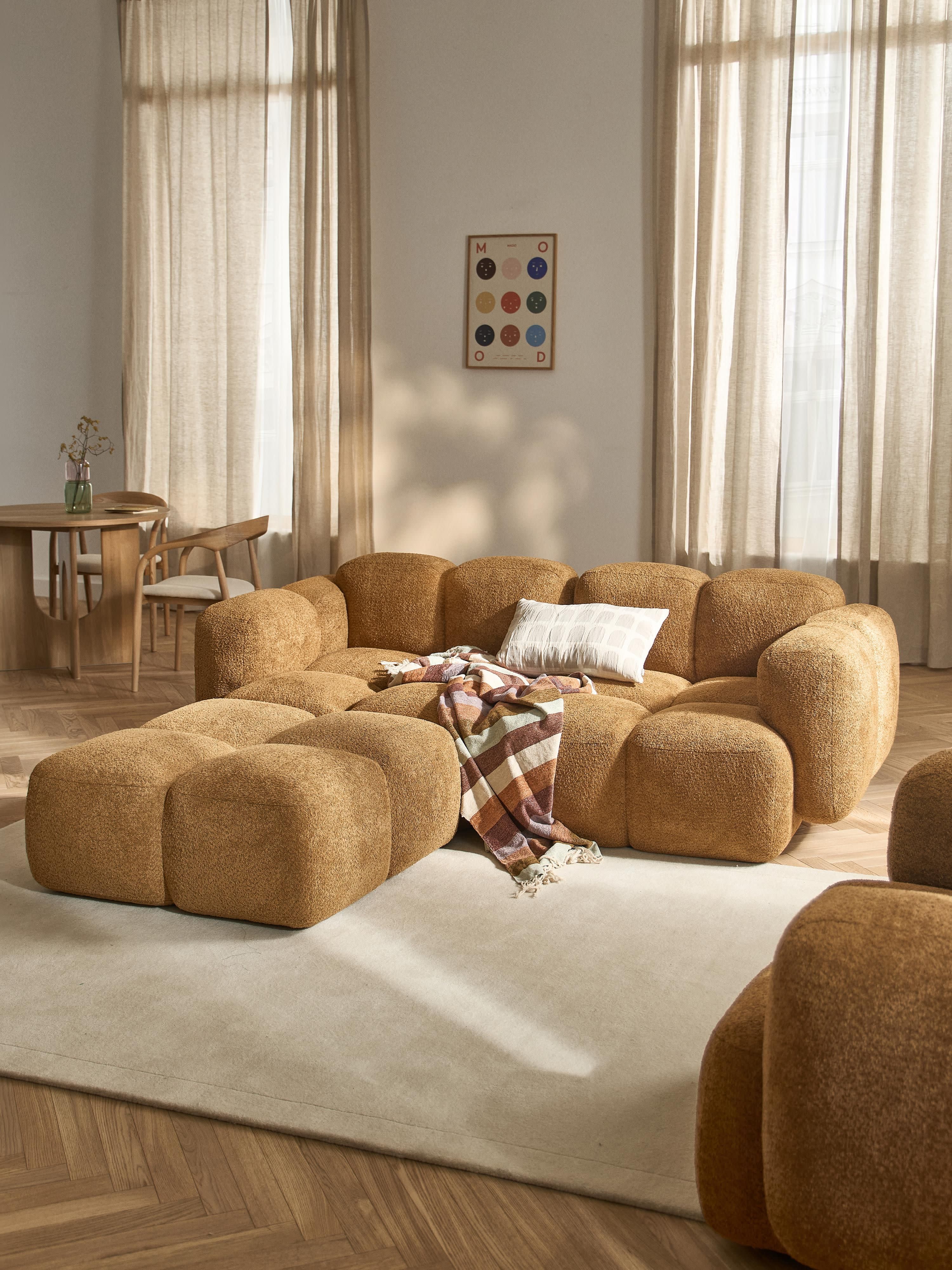 Modulaire bank Tayla (3-zits) van teddy bouclé met poef (links/rechts)