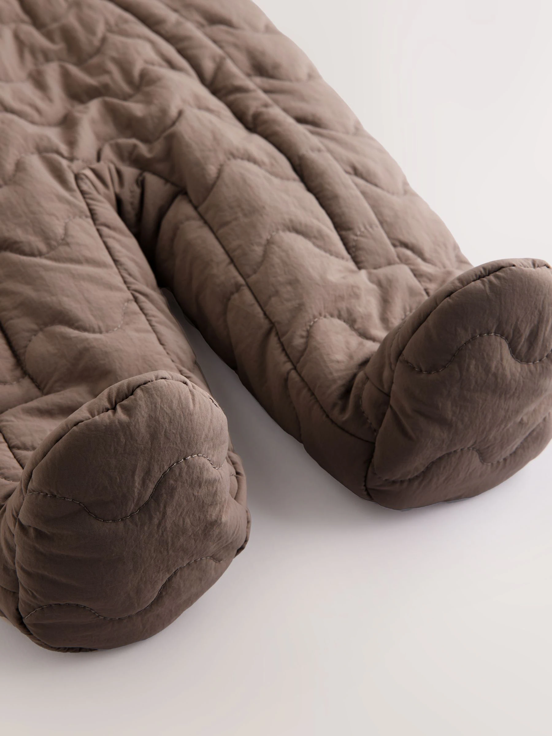 Bruin - Baby all-in-one van nylon met capuchon (0-18mnd)