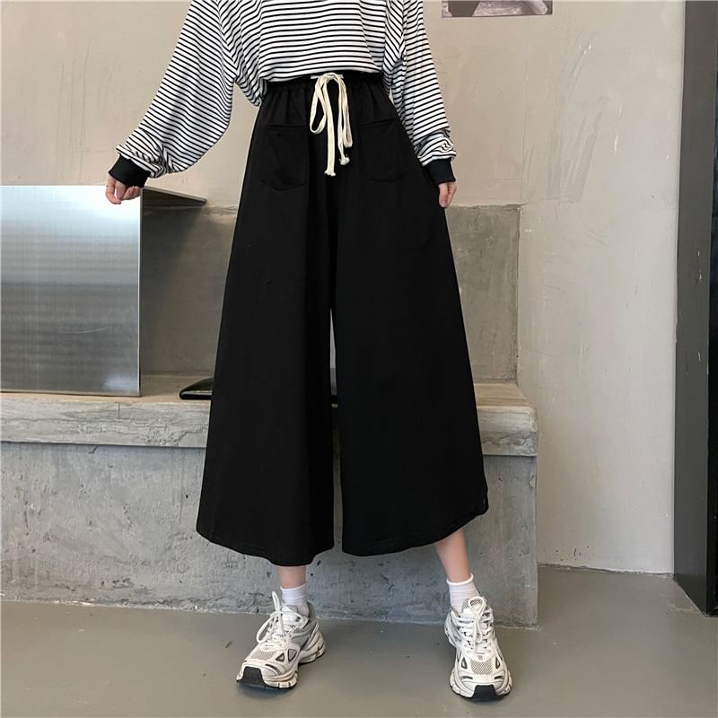 Sisyphi - Capri-broek met trekkoord in de taille en wijde pijpen