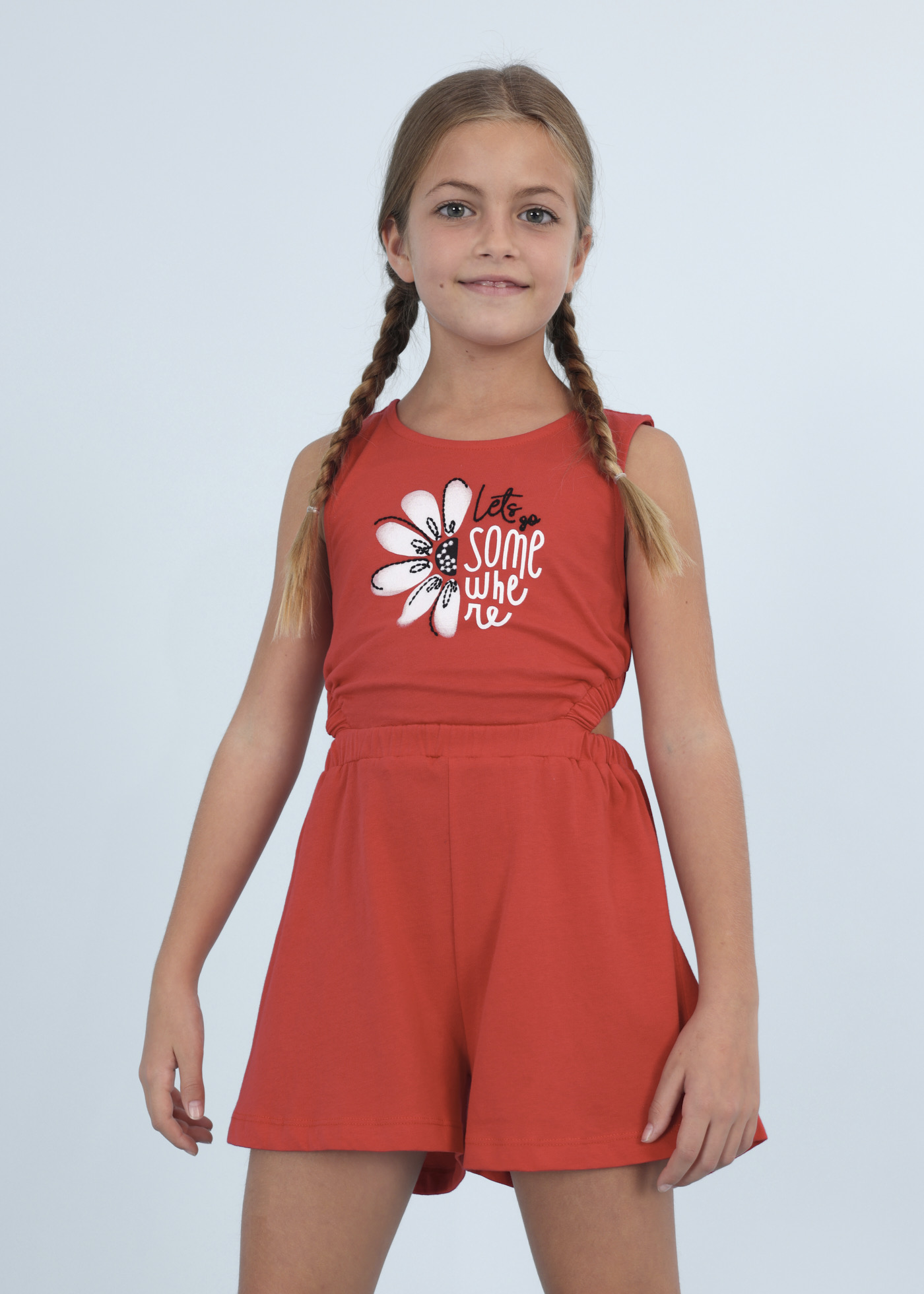 Macacão curto com estampa floral para menina