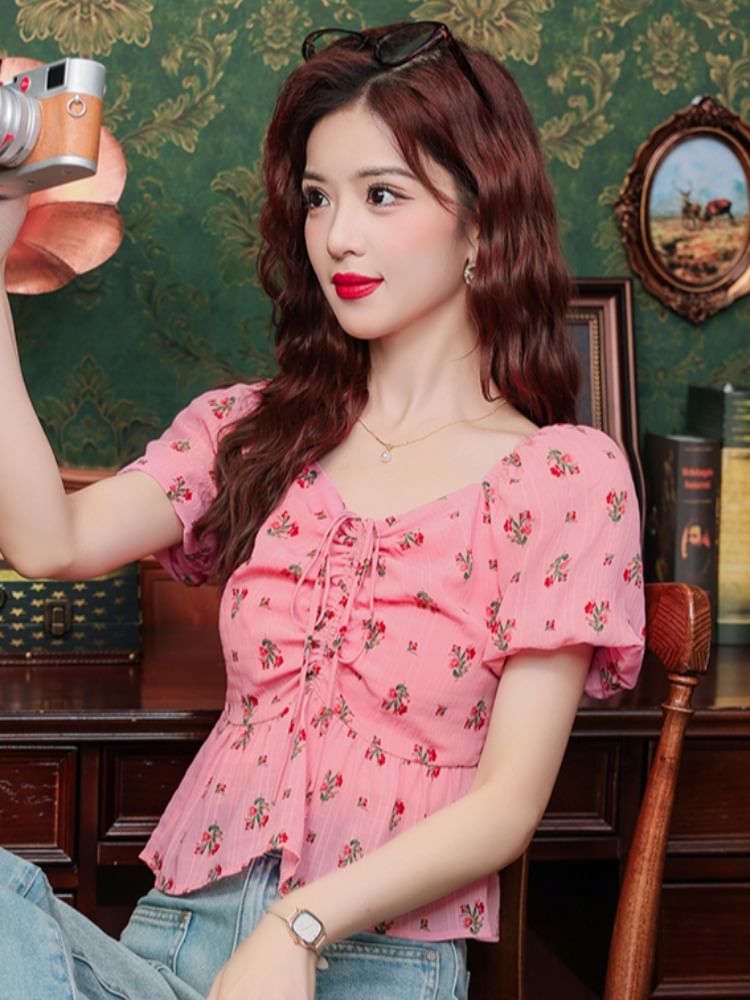 Bornite - Blouse met pofmouwen, V-hals, bloemenprint en trekkoord, peplum