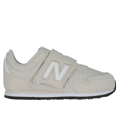 New Balance Schuhe - 323 - Timberwolf/Sea Salt