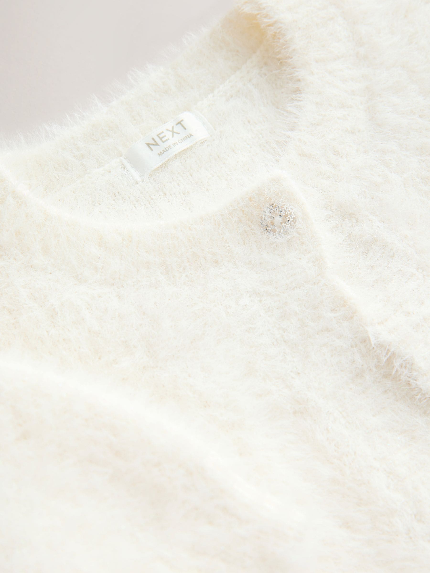 Ecru - Fluffy bolero met korte mouwen (12mnd-16jr)