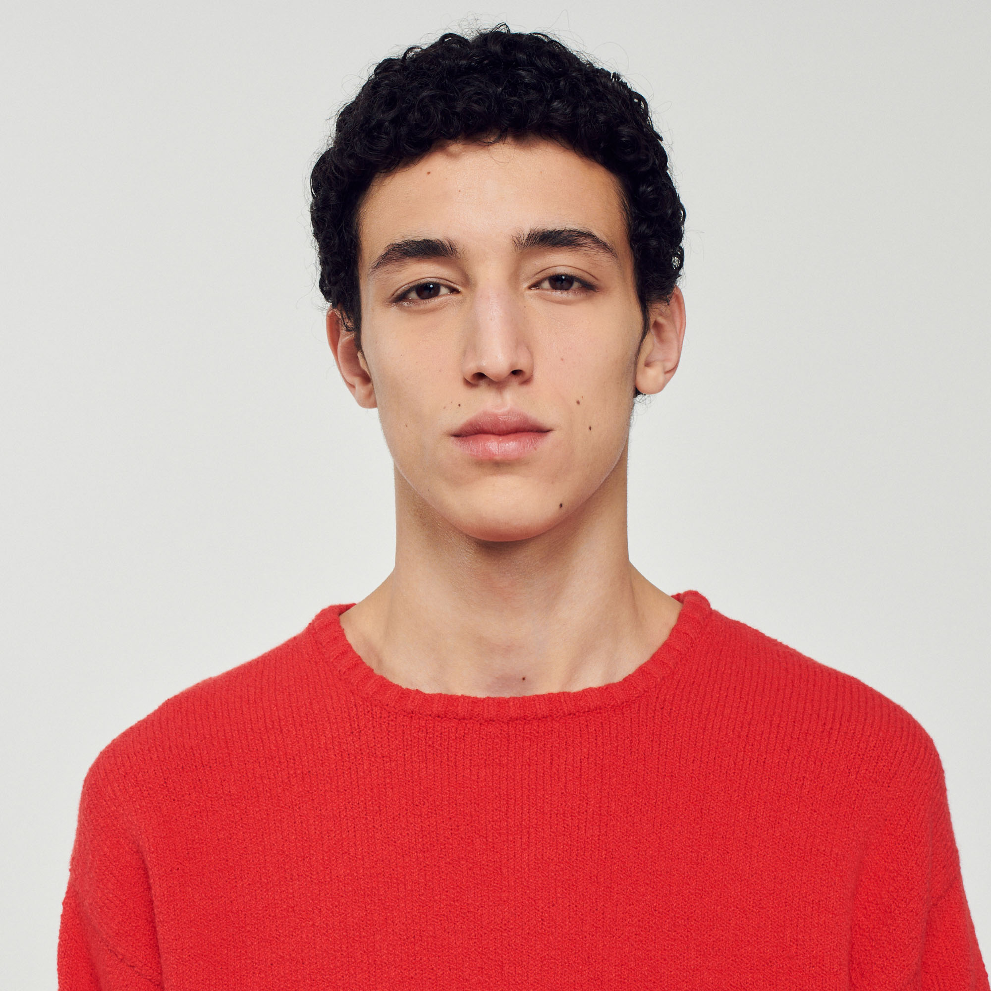 Pull en maille bouclee