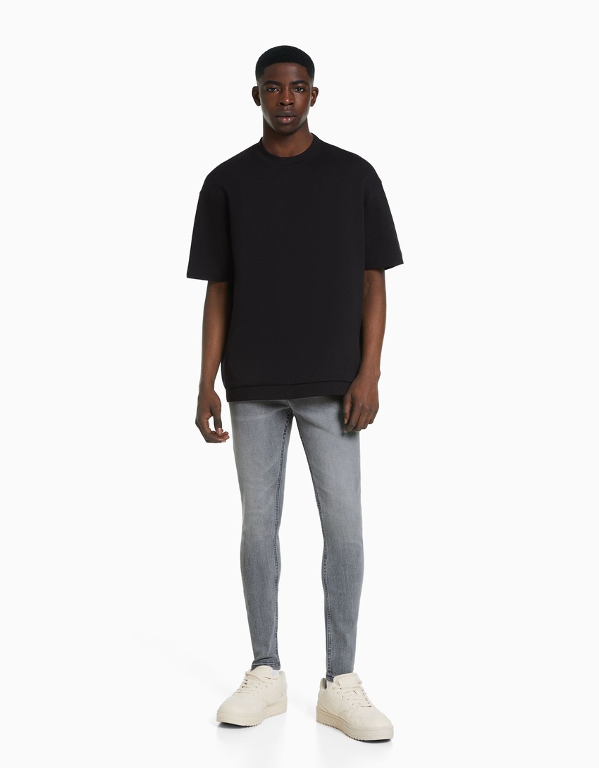 calças jeans super skinny