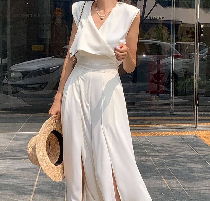 palajana - Mouwloze jumpsuit met split aan de voorkant
